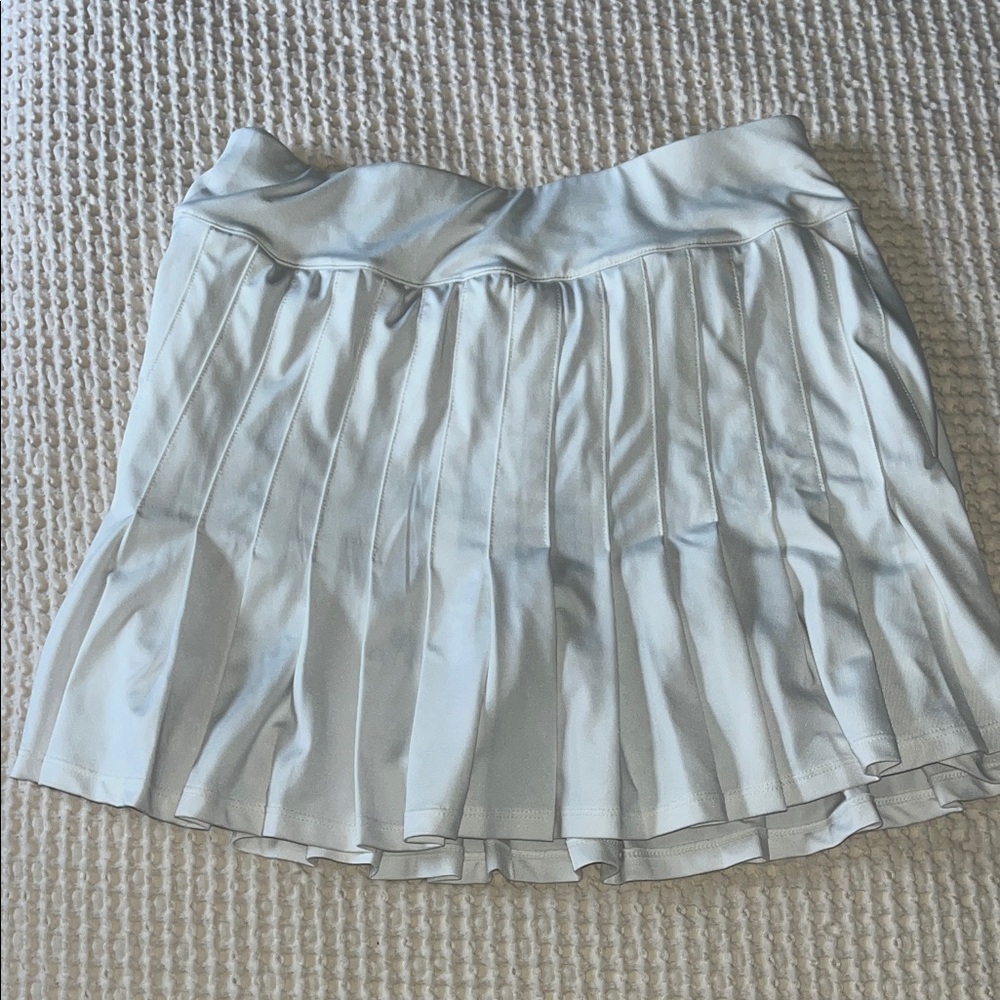 Tuckernuck Elegant White Pleated Tennis Skirt with Floral shorts